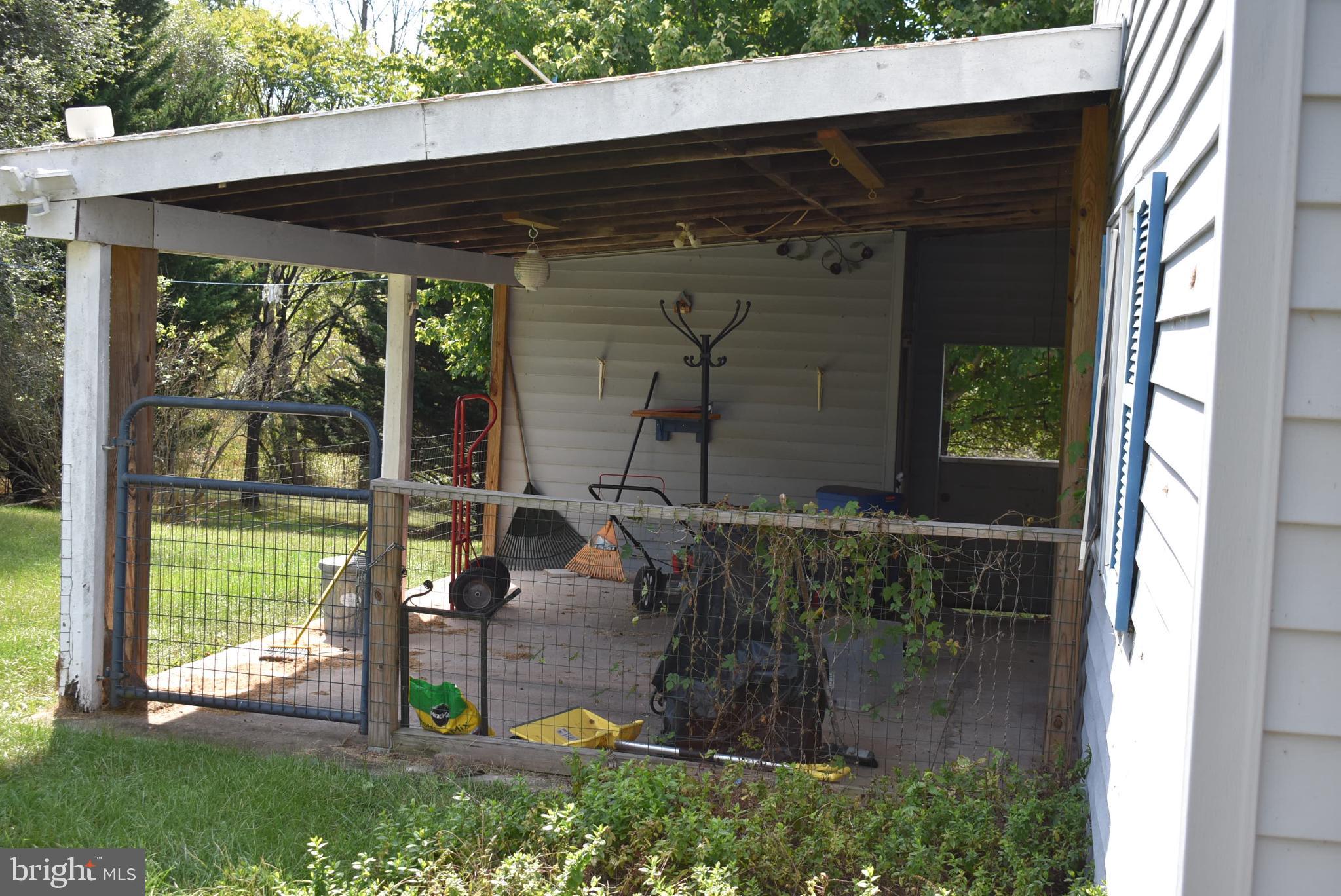 1971 Duckwall Road Berkeley Springs, WV 25411 - Photo 26 of 64 Charming outdoor space with rustic appeal.