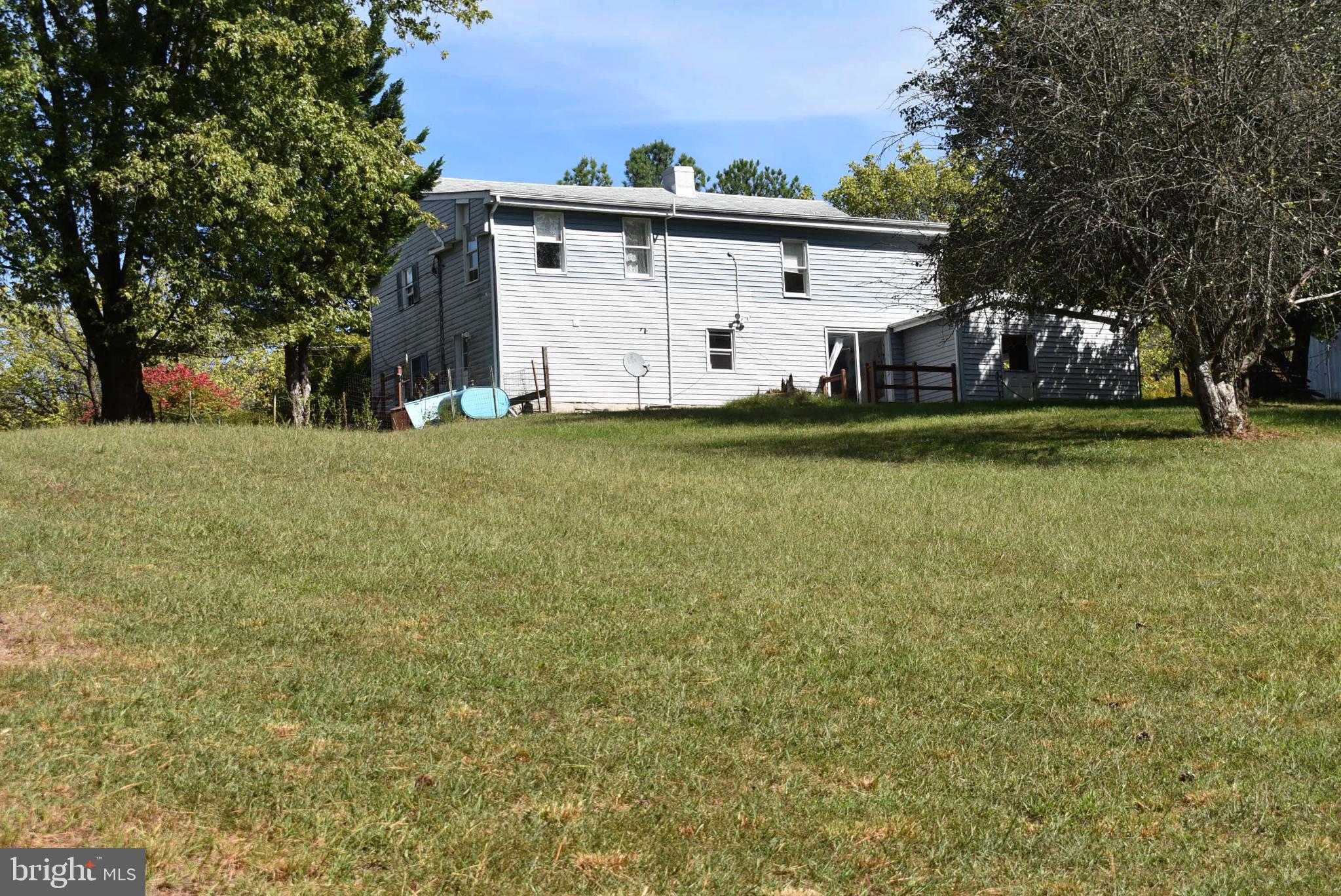 1971 Duckwall Road Berkeley Springs, WV 25411 - Photo 28 of 64 Charming home nestled in lush greenery.