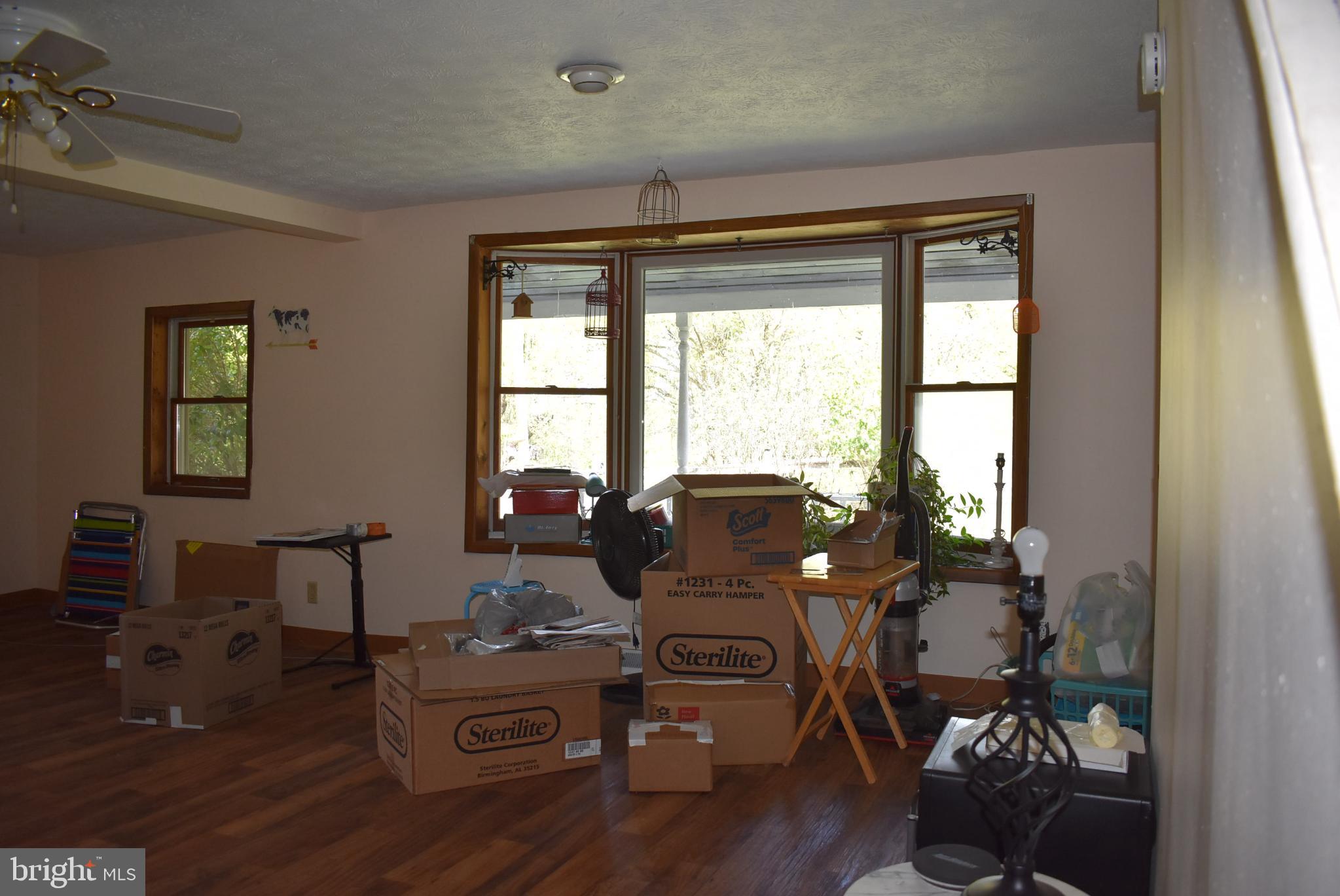 1971 Duckwall Road Berkeley Springs, WV 25411 - Photo 40 of 64 a living room with furniture and a window