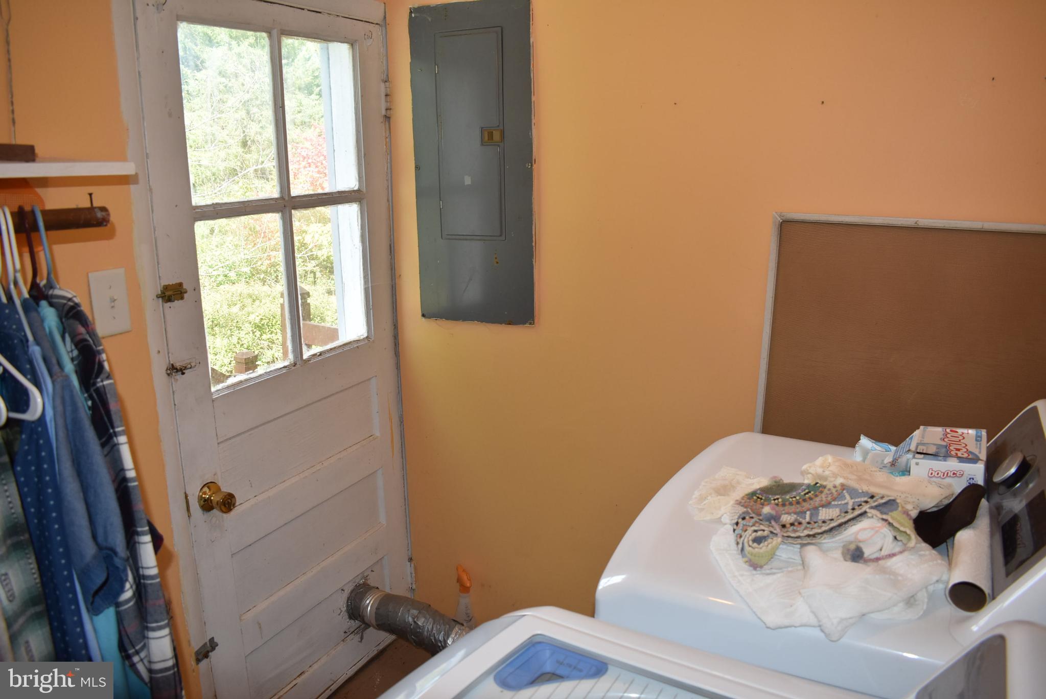 1971 Duckwall Road Berkeley Springs, WV 25411 - Photo 52 of 64 a bedroom with a bed and a window