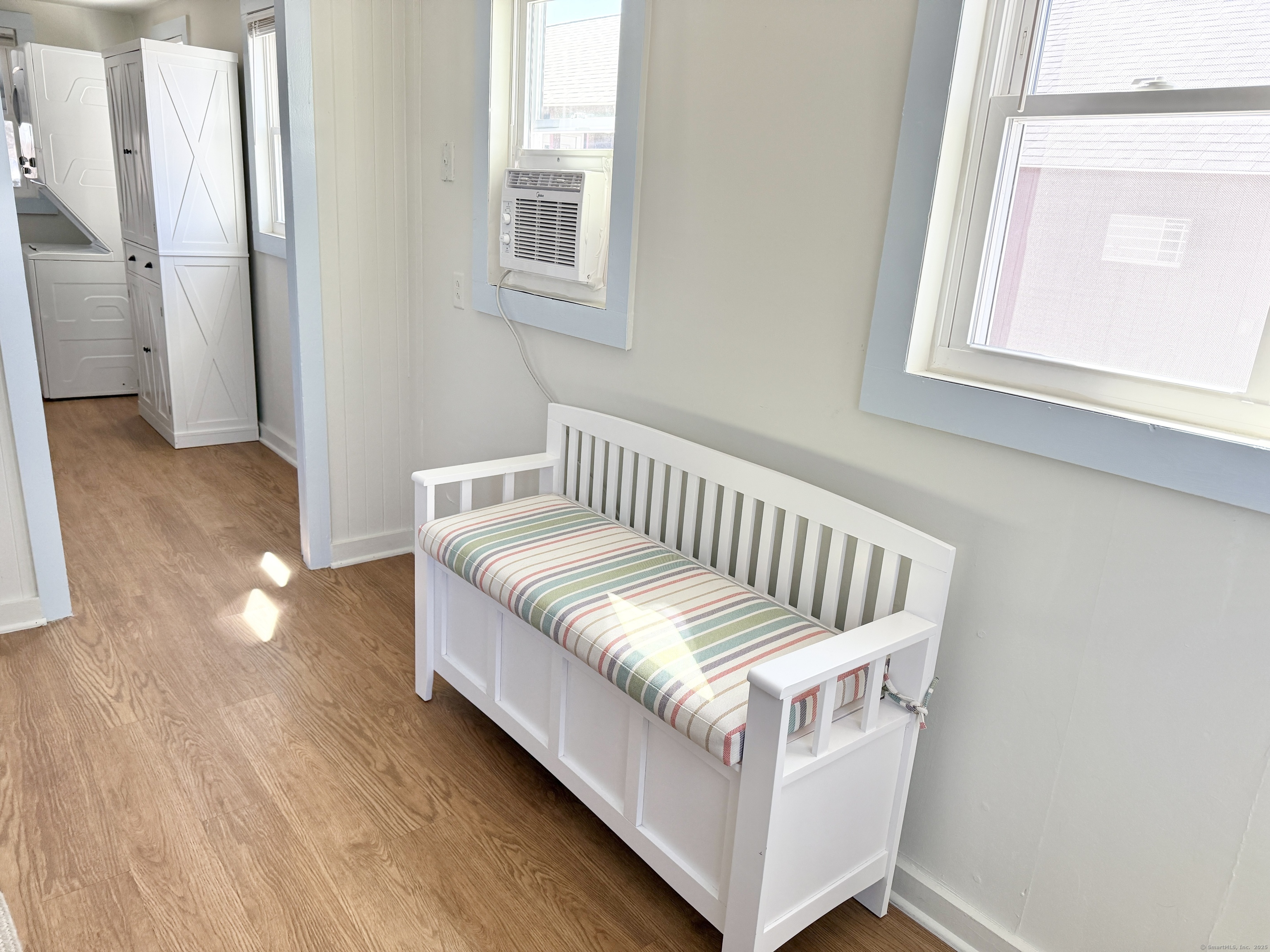 102 Chalker Beach Road Old Saybrook, CT 06475 - Photo 12 of 22 a view of a bedroom with wooden floor