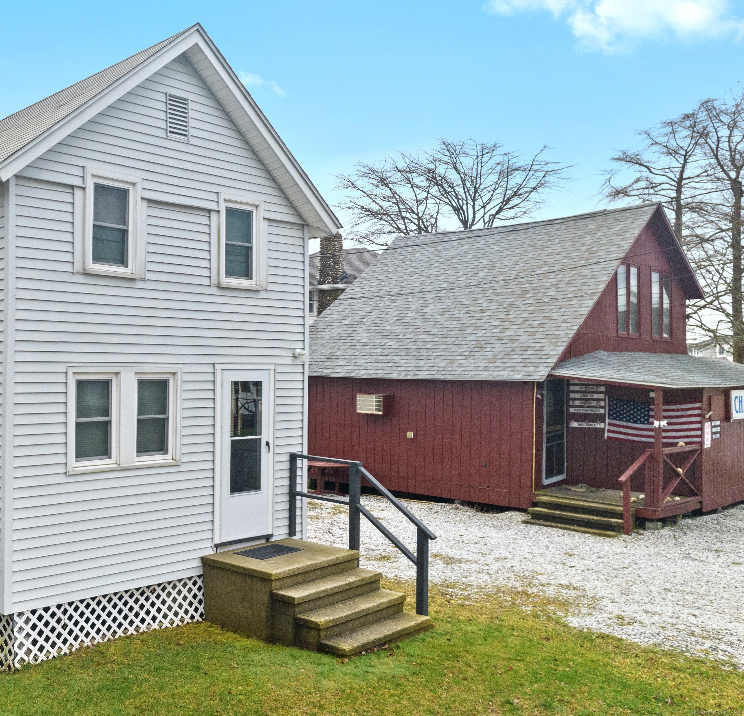 102 Chalker Beach Road Old Saybrook, CT 06475 - Photo 4 of 22 a backyard of a house with barbeque oven table and chairs