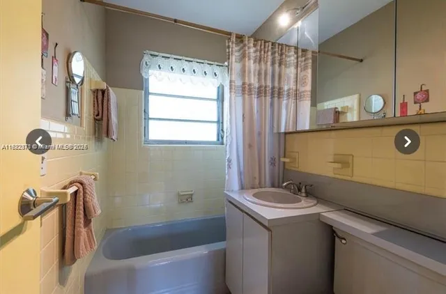 a bathroom with a sink and a bathtub