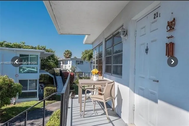 a outdoor space with lots of tables and chairs