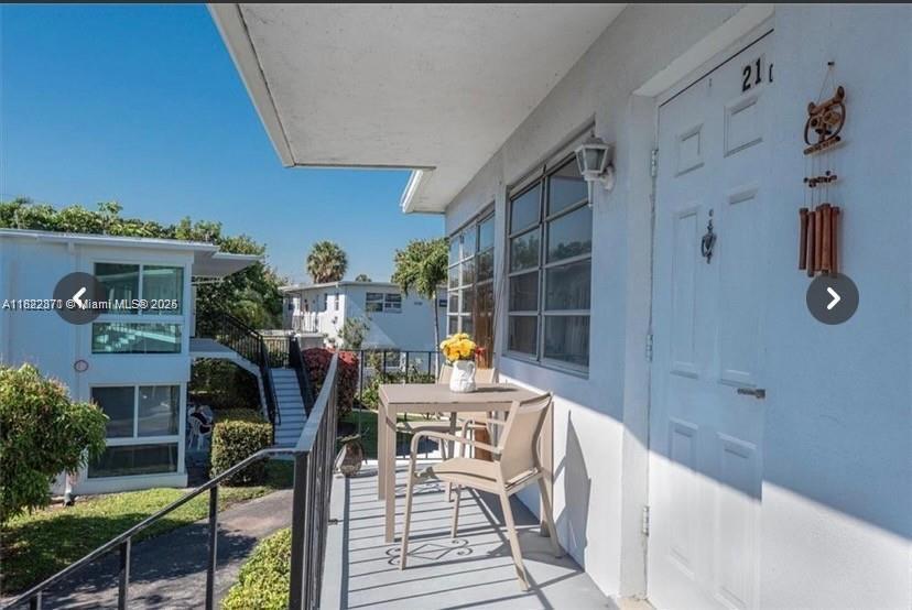 1125 Southeast 14th Place, Unit 21C Fort Lauderdale, FL 33316 - Photo 10 of 18 a outdoor space with lots of tables and chairs