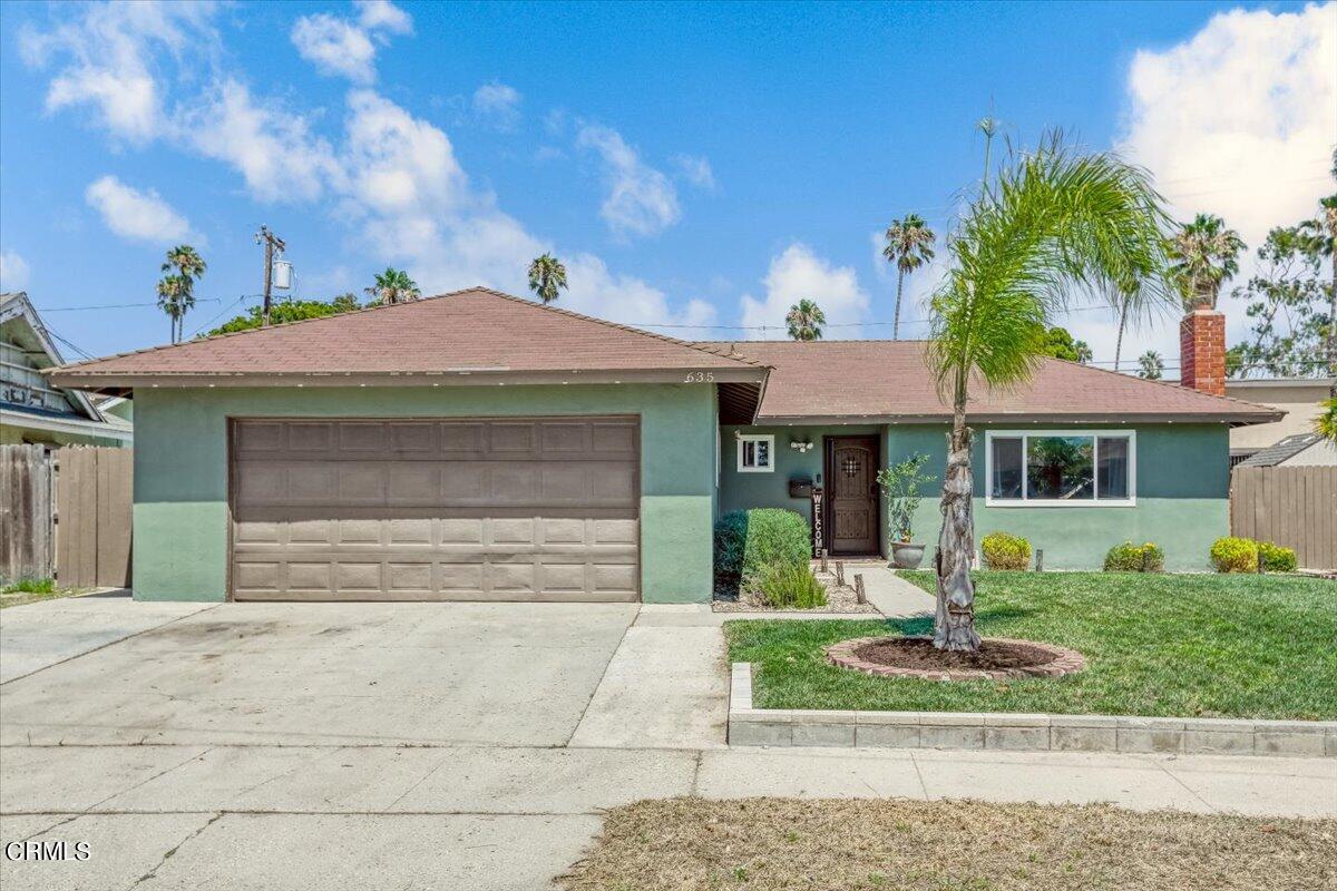 635 Oleander Drive Oxnard, CA 93033 - Photo 1 of 37 a front view of a house with a garden