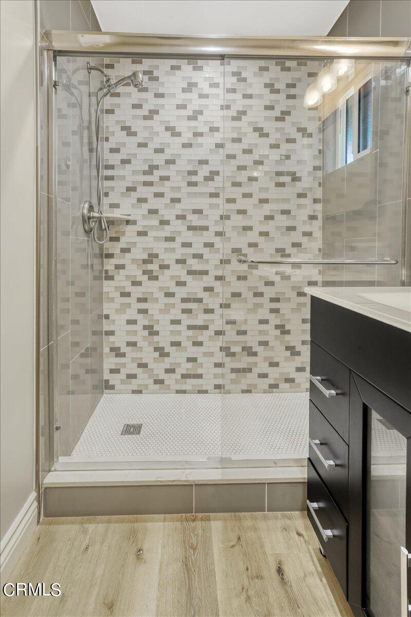 635 Oleander Drive Oxnard, CA 93033 - Photo 22 of 37 a bathroom with a bathtub and shower