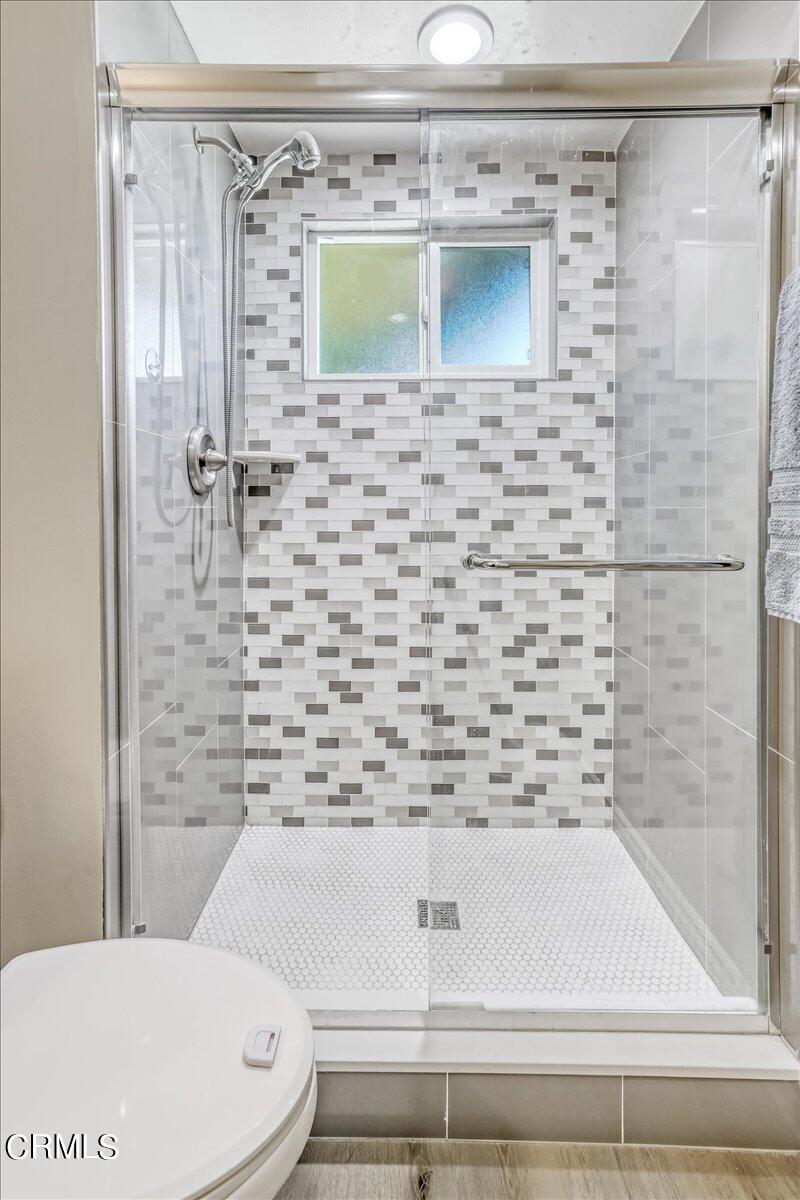 635 Oleander Drive Oxnard, CA 93033 - Photo 30 of 37 a bathroom with a toilet and a shower