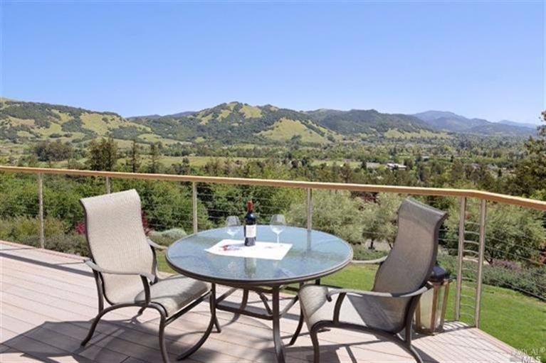 3533 Deer Trail Road Santa Rosa, CA 95404 - Photo 1 of 1 a view of a chairs and table in the roof deck