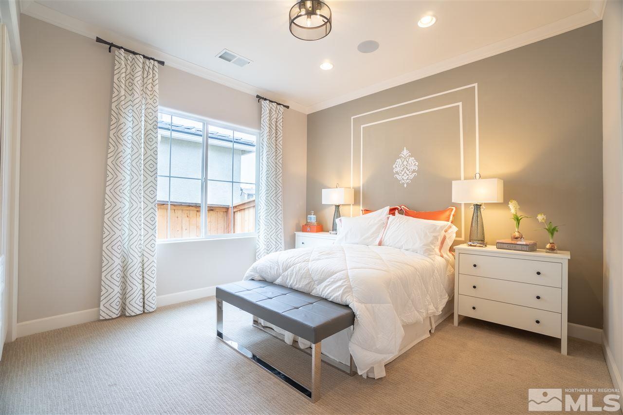 2860 Ethelinda Way, Unit LOT 13 Reno, NV 89521 - Photo 16 of 23 a spacious bedroom with a bed and window