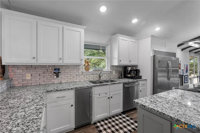 a bed room with a bed and a couch