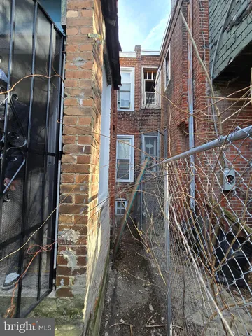 a view of a brick house with a door