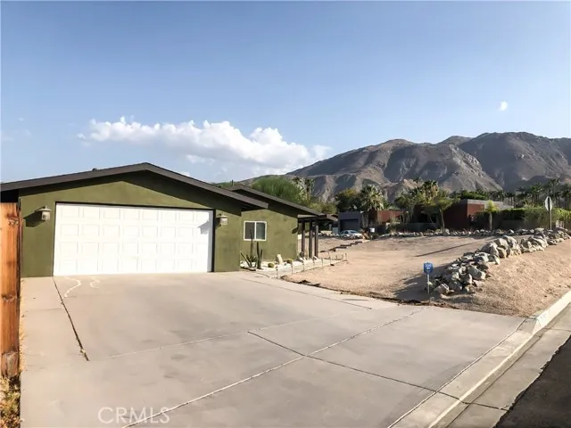 71292 Biskra Road Rancho Mirage, CA 92270 - Photo 24 of 27 a view of a house with a outdoor space