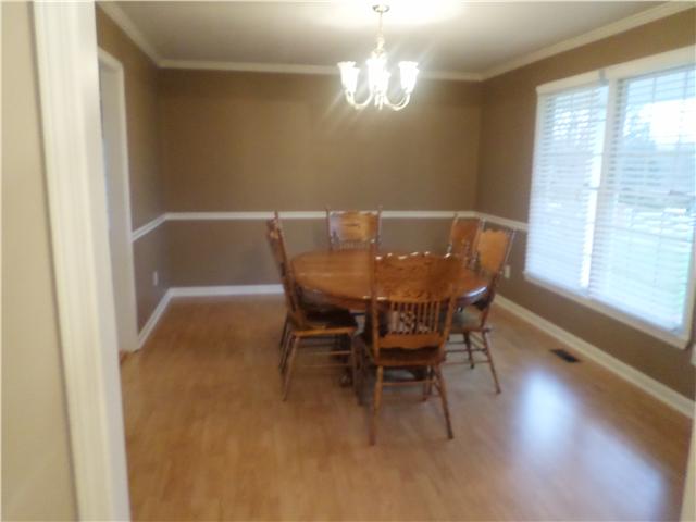 1156 Young Road Lebanon, TN 37090 - Photo 13 of 20 a view of a dining room with furniture window and wooden floor