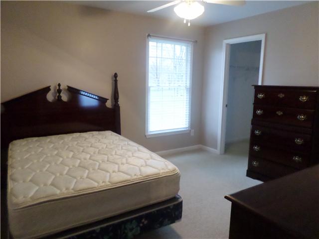1156 Young Road Lebanon, TN 37090 - Photo 18 of 20 a bedroom with a bed and a closet