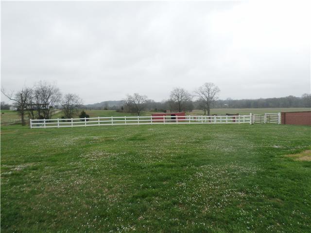 1156 Young Road Lebanon, TN 37090 - Photo 7 of 20 a view of a big green field with trees in the background