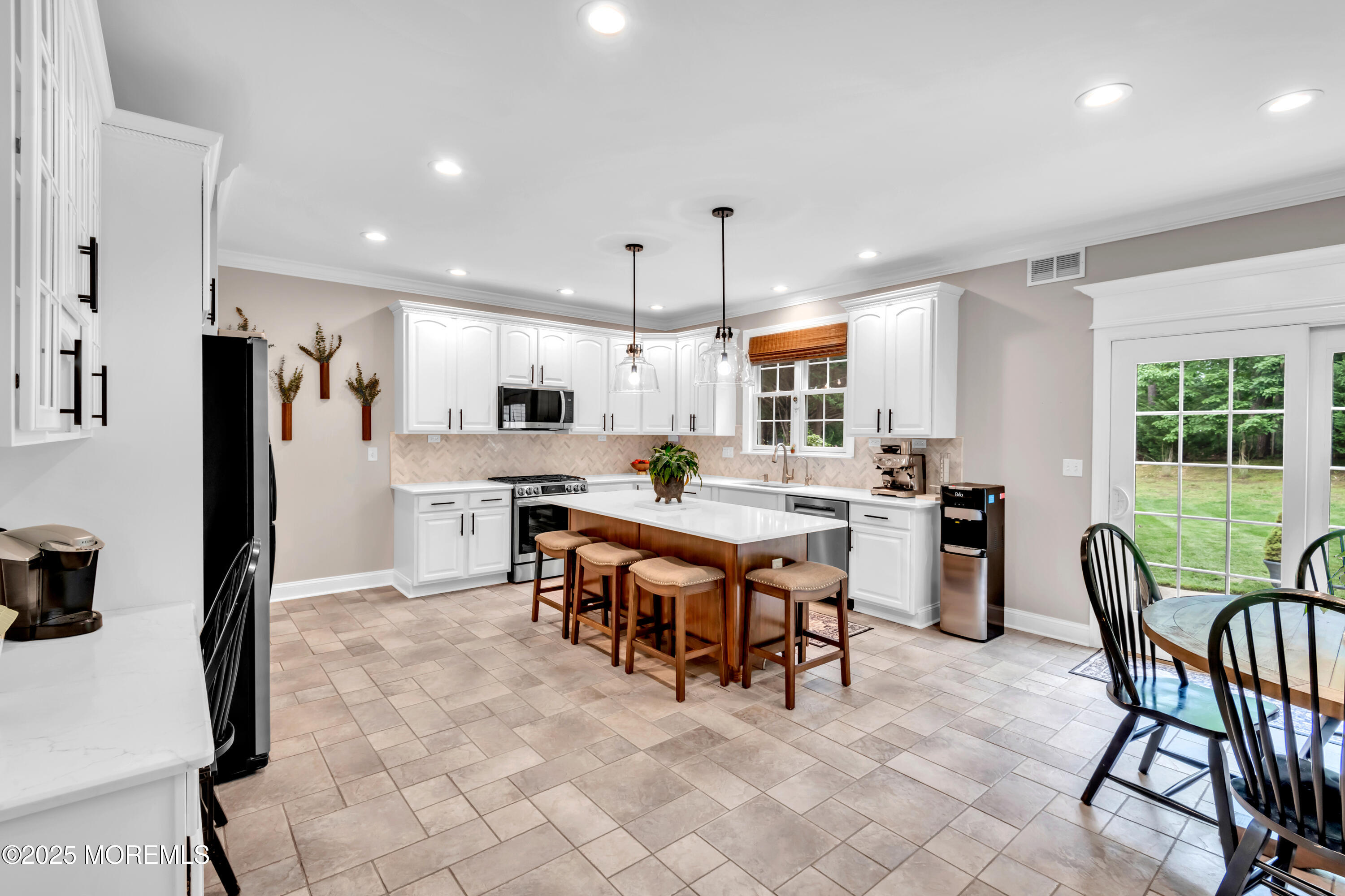 15 Conor Road Jackson, NJ 08527 - Photo 35 of 77 a large kitchen with a table and chairs