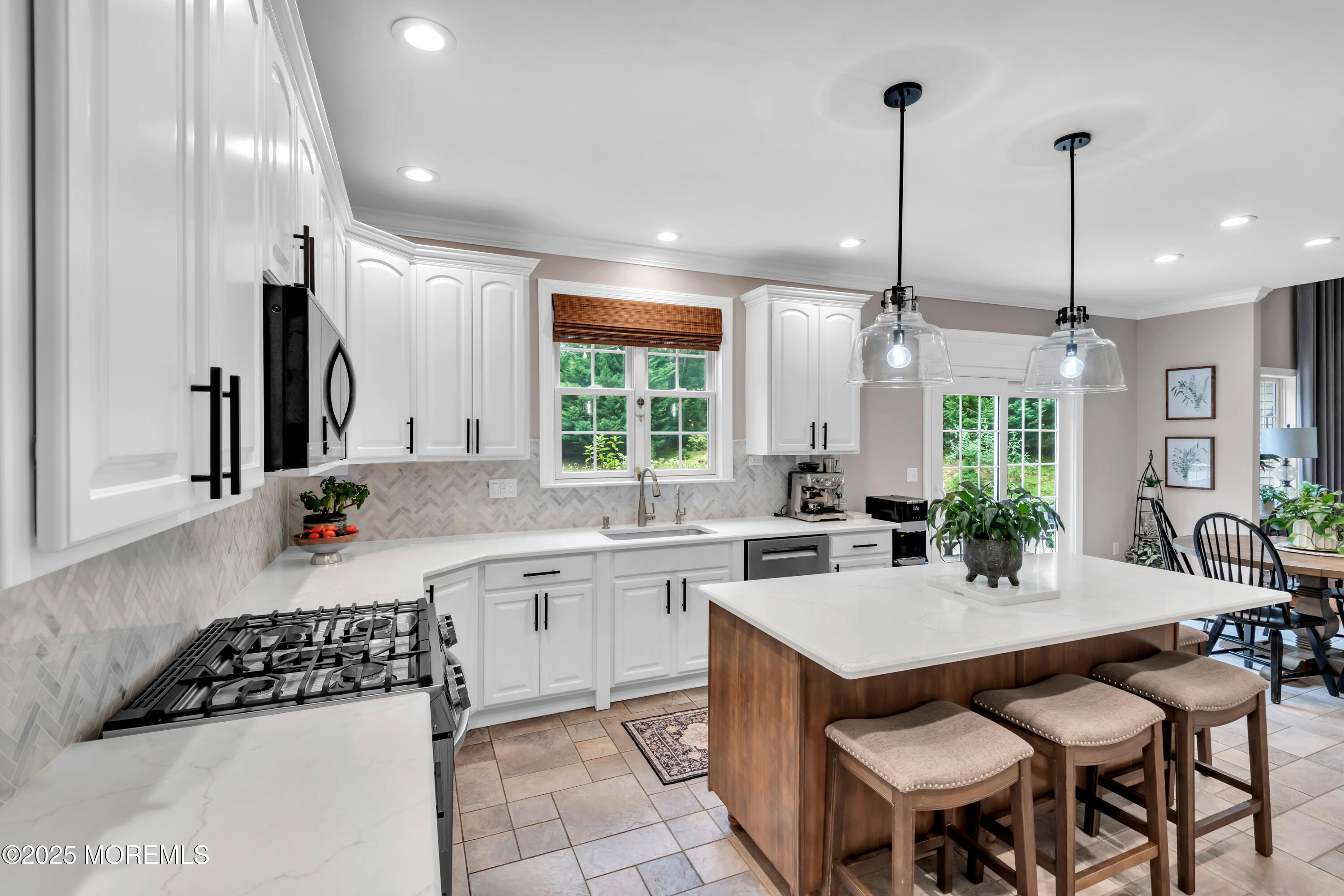 15 Conor Road Jackson, NJ 08527 - Photo 39 of 77 a kitchen with a sink stove and cabinets