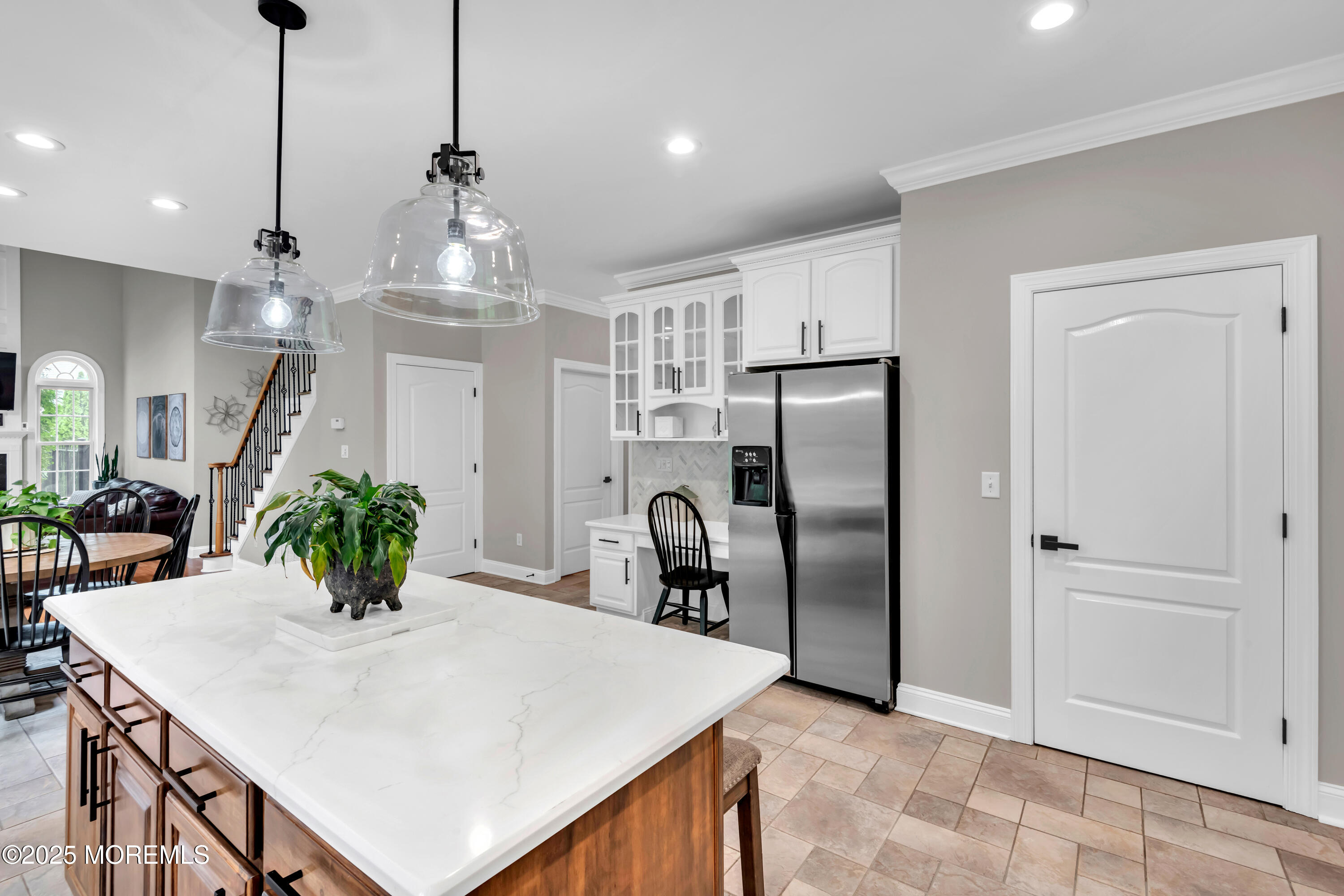 15 Conor Road Jackson, NJ 08527 - Photo 41 of 77 a view of a kitchen with kitchen island a refrigerator a sink and a dining table