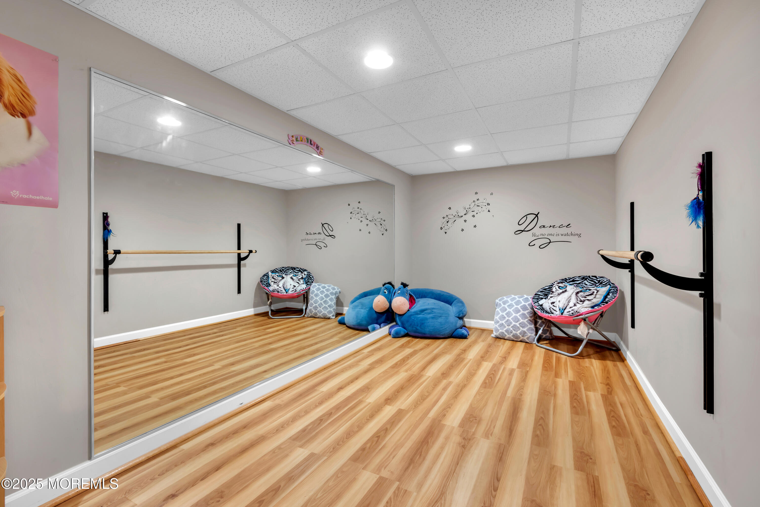 15 Conor Road Jackson, NJ 08527 - Photo 67 of 77 a bedroom with bed and a chandelier