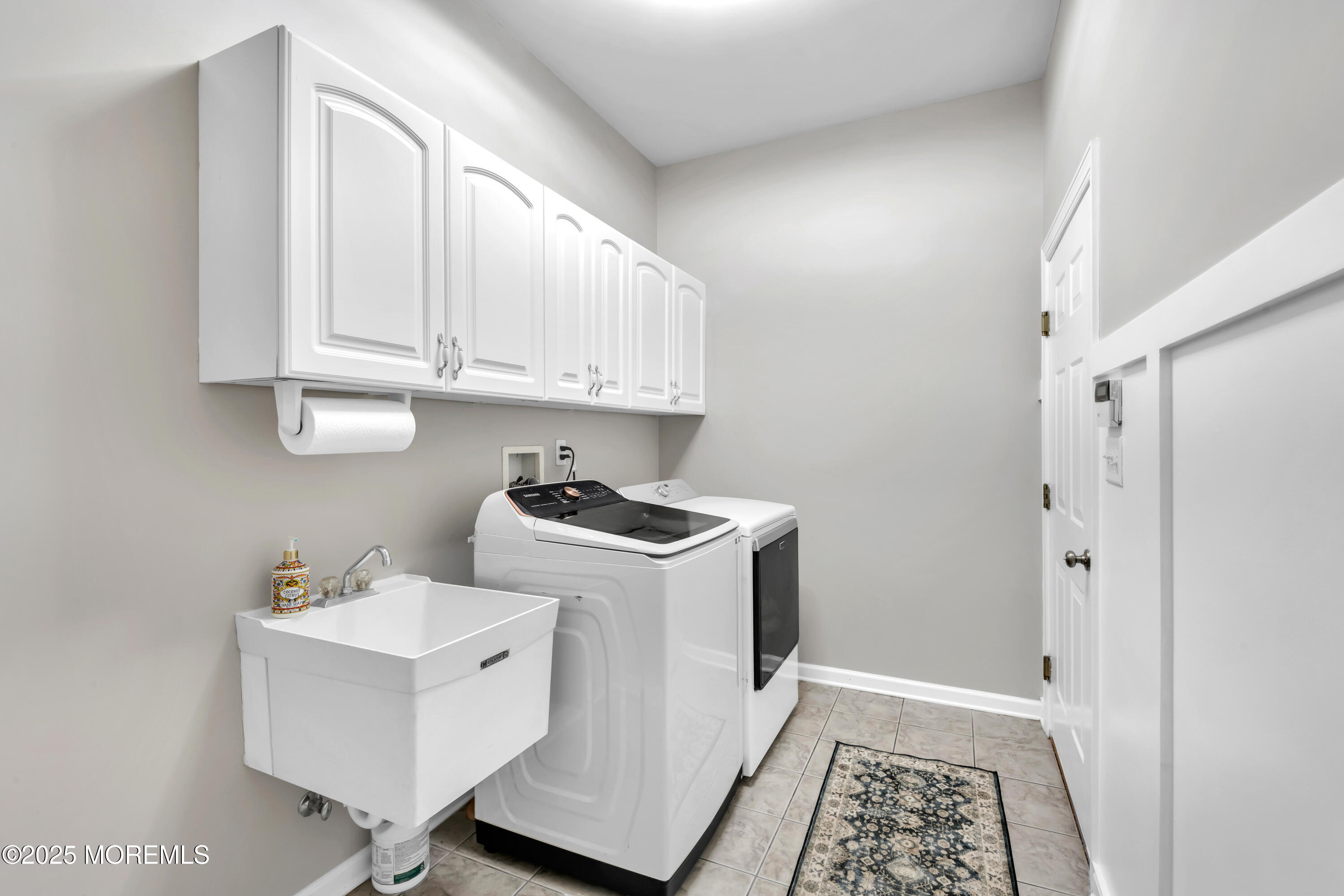 15 Conor Road Jackson, NJ 08527 - Photo 73 of 77 a view of kitchen with white cabinets and white appliances