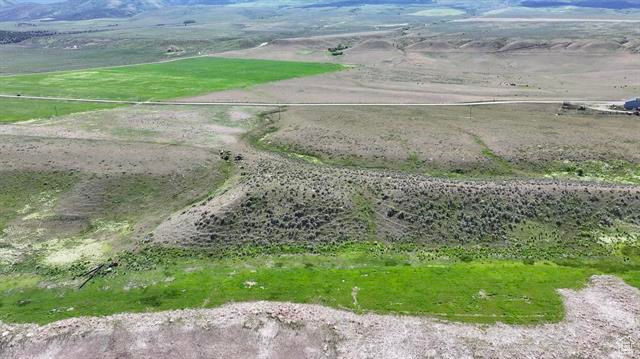 22000 South Marsh Valley Road Downey, ID 83234 - Photo 7 of 8 Overview of rural landscape with a mountain backdrop