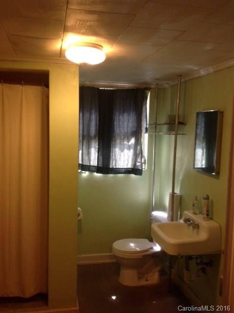 4205 River Road Hickory, NC 28602 - Photo 11 of 22 a bathroom with a sink and a mirror