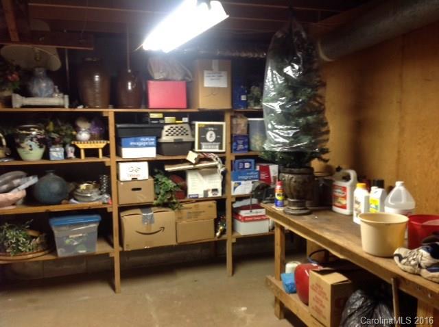4205 River Road Hickory, NC 28602 - Photo 13 of 22 a room with lots of bottles and chairs