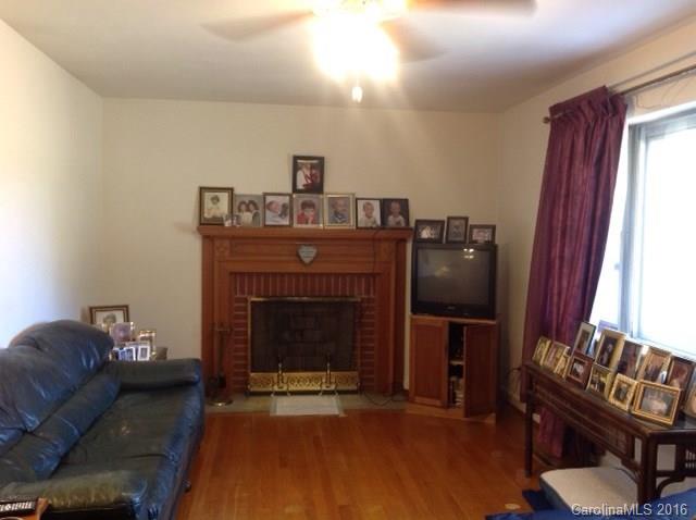 4205 River Road Hickory, NC 28602 - Photo 5 of 22 a living room with furniture and a fireplace