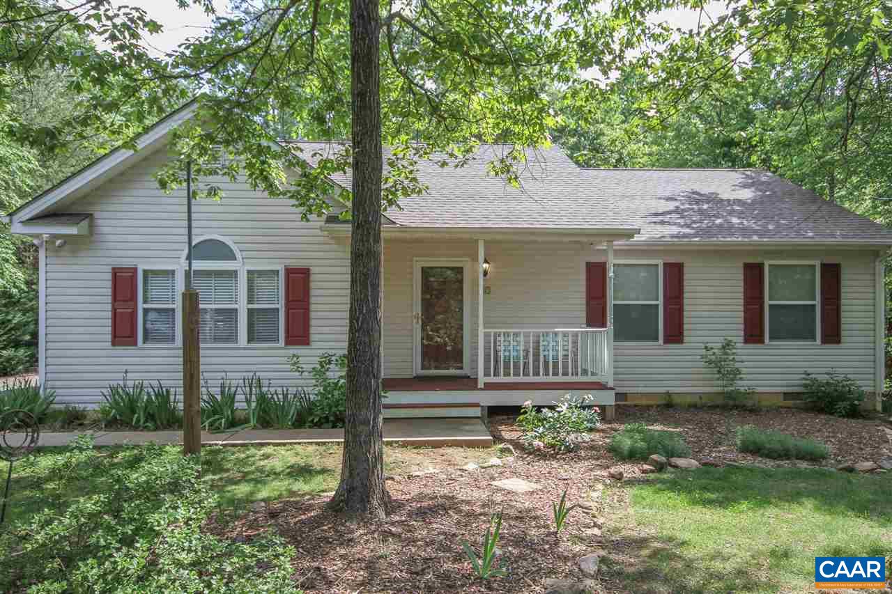 13 Deer Path Road Palmyra, VA 22963 - Photo 1 of 17 a front view of a house with garden
