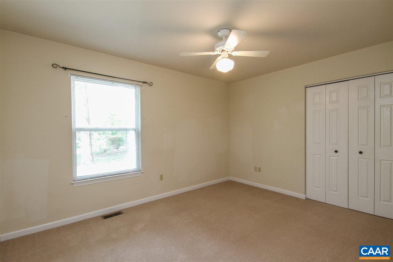 13 Deer Path Road Palmyra, VA 22963 - Photo 11 of 17 an empty room with a window