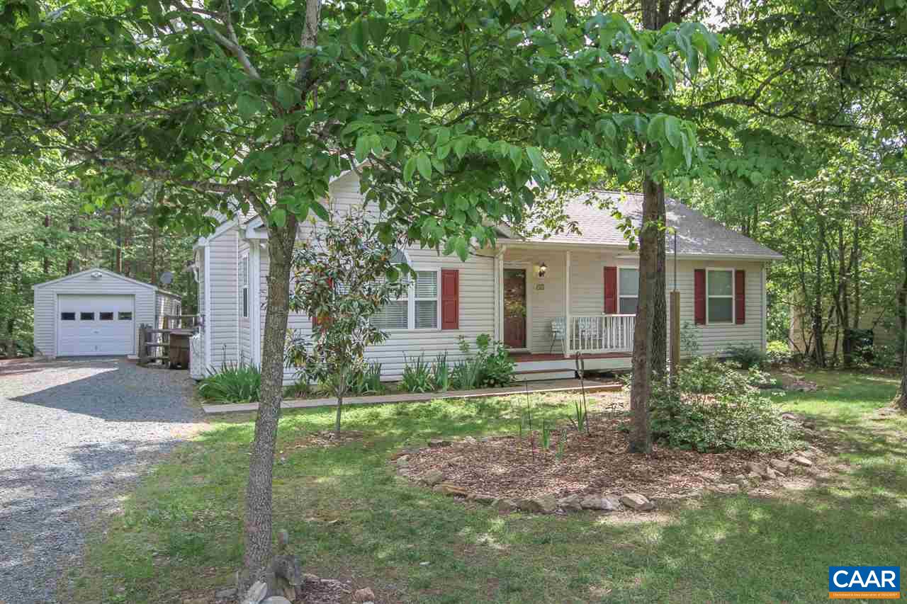 13 Deer Path Road Palmyra, VA 22963 - Photo 15 of 17 a front view of a house with garden