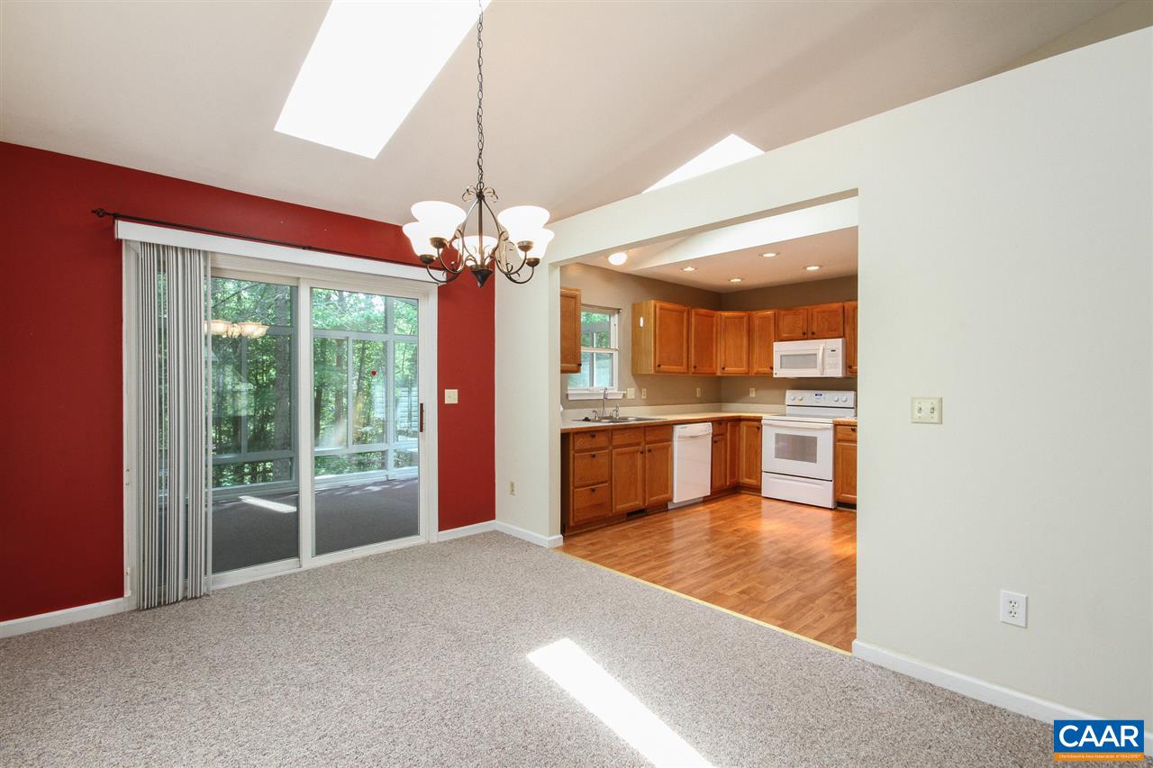13 Deer Path Road Palmyra, VA 22963 - Photo 7 of 17 a view of kitchen with granite countertop sink and refrigerator