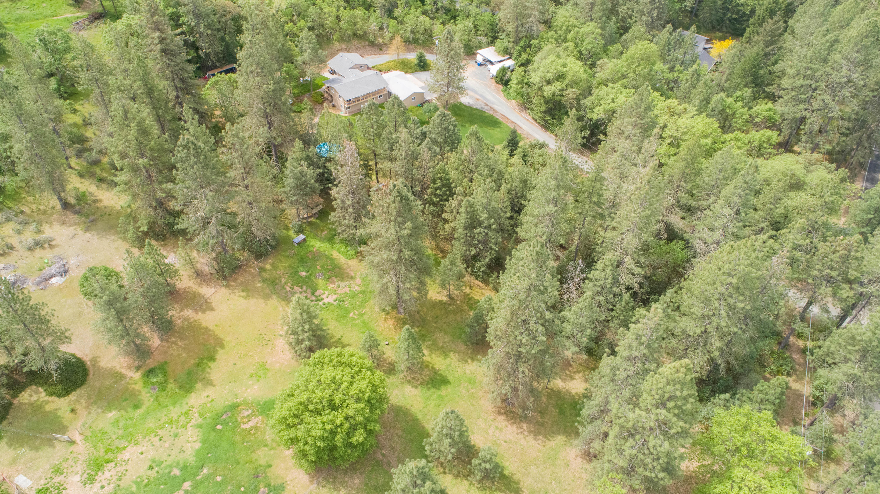 1068 Wards Creek Road Rogue River, OR 97537 - Photo 11 of 57 Aerial of pasture, trees, home and property.