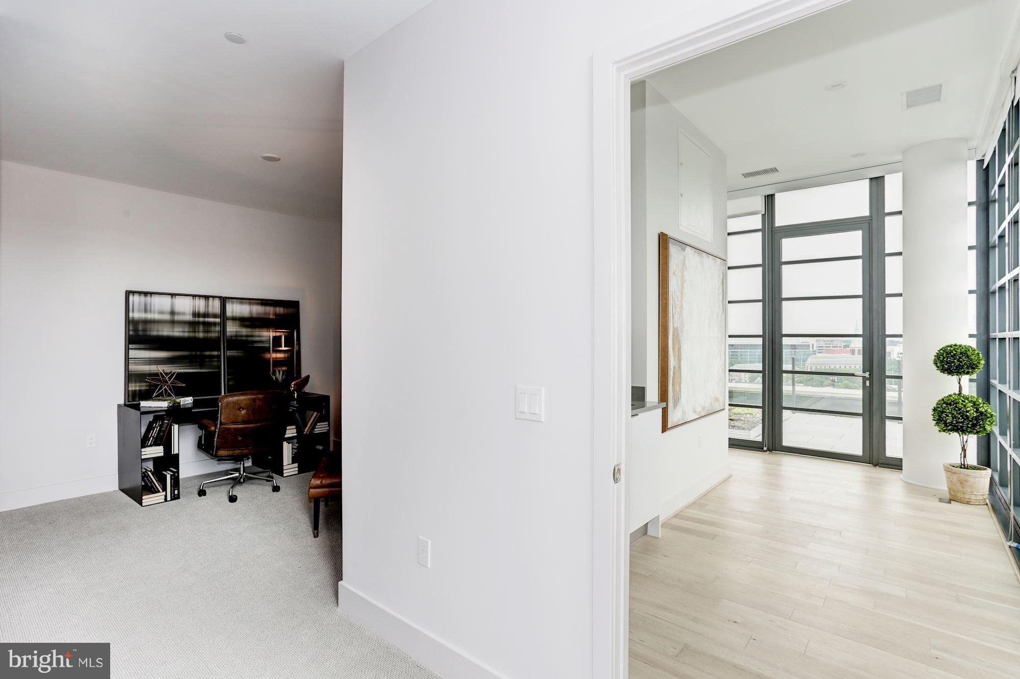 45 Sutton Square Southwest, Unit PH20 Washington, DC 20024 - Photo 12 of 21 a view of livingroom with furniture and closet