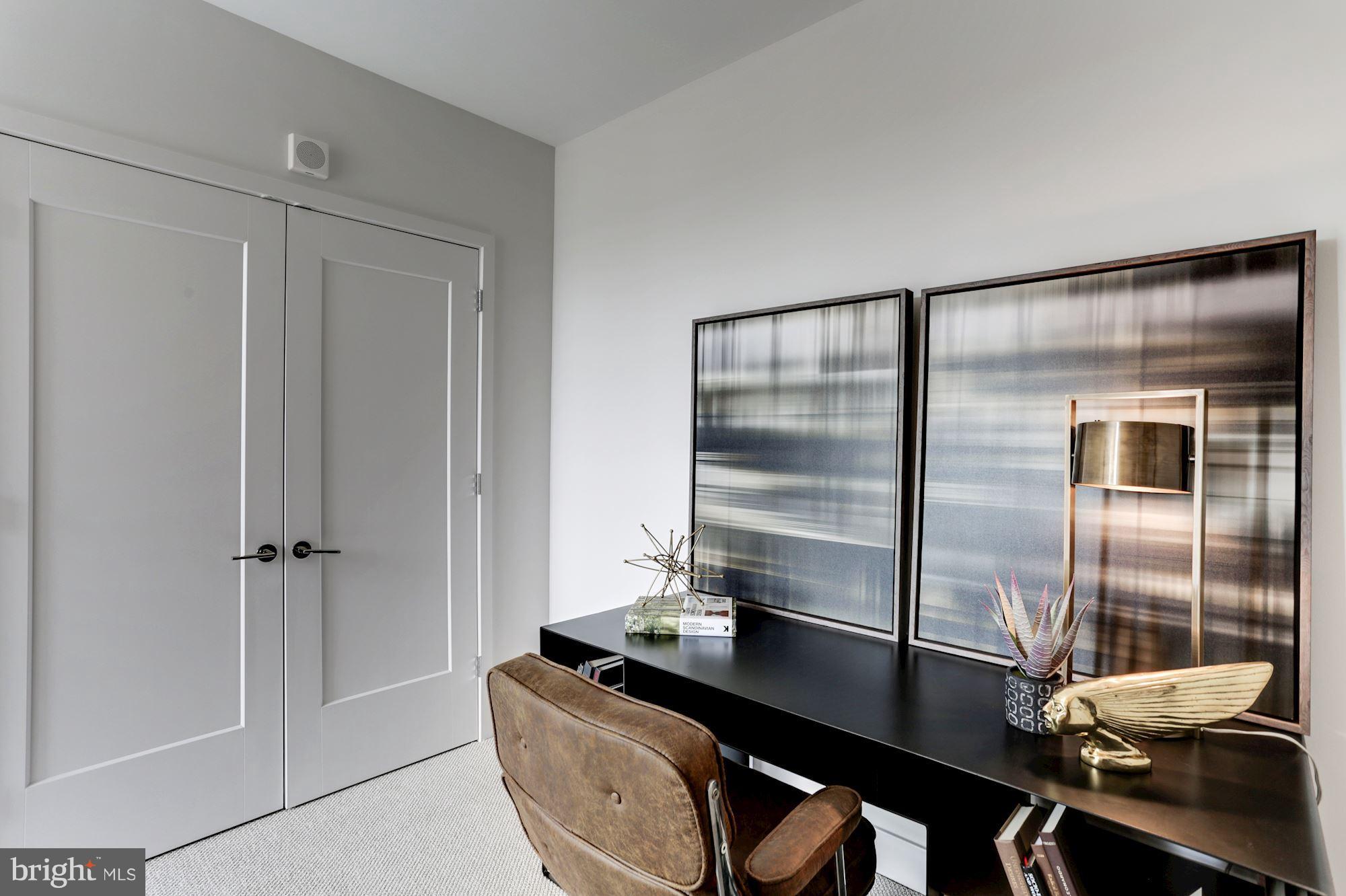 45 Sutton Square Southwest, Unit PH20 Washington, DC 20024 - Photo 13 of 21 a kitchen with a refrigerator and countertop