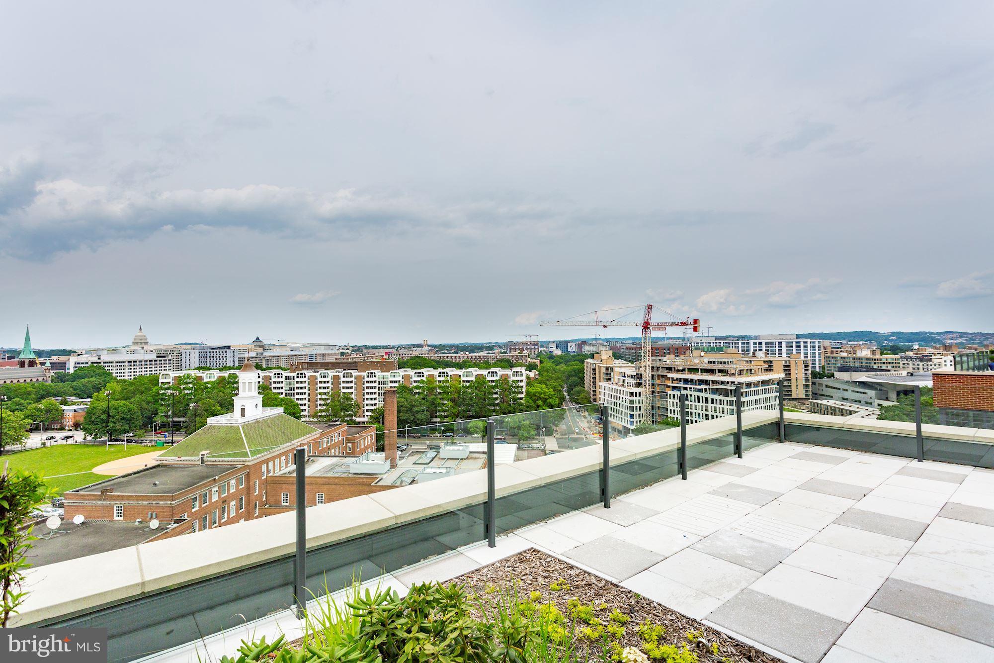 45 Sutton Square Southwest, Unit PH20 Washington, DC 20024 - Photo 15 of 21 a view of a terrace with a bench