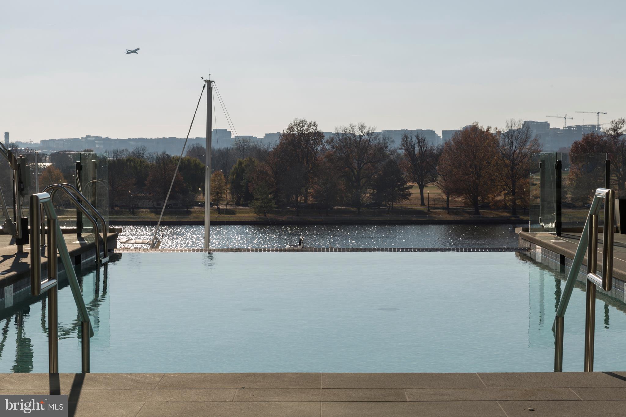 45 Sutton Square Southwest, Unit PH20 Washington, DC 20024 - Photo 21 of 21 a view of a lake with a mountain