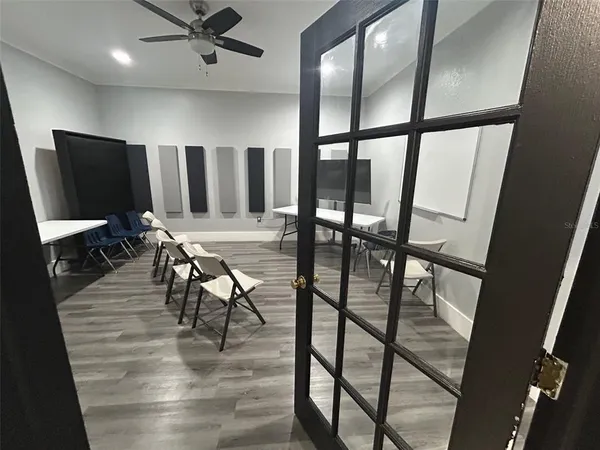 a view of a chairs and table in a room