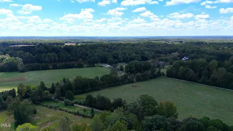 a view of a yard with a garden