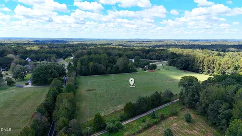 a view of a golf course with a garden