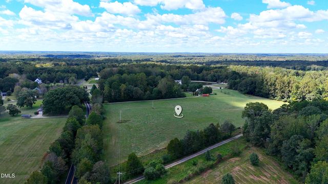 a view of a golf course with a garden