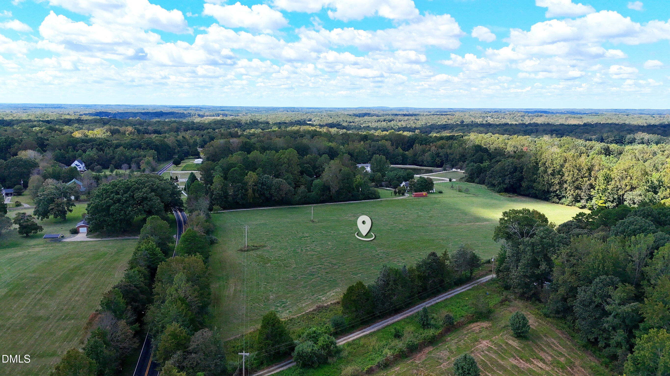 1 High Rock Road Efland, NC 27243 - Photo 4 of 15 a view of a golf course with a garden