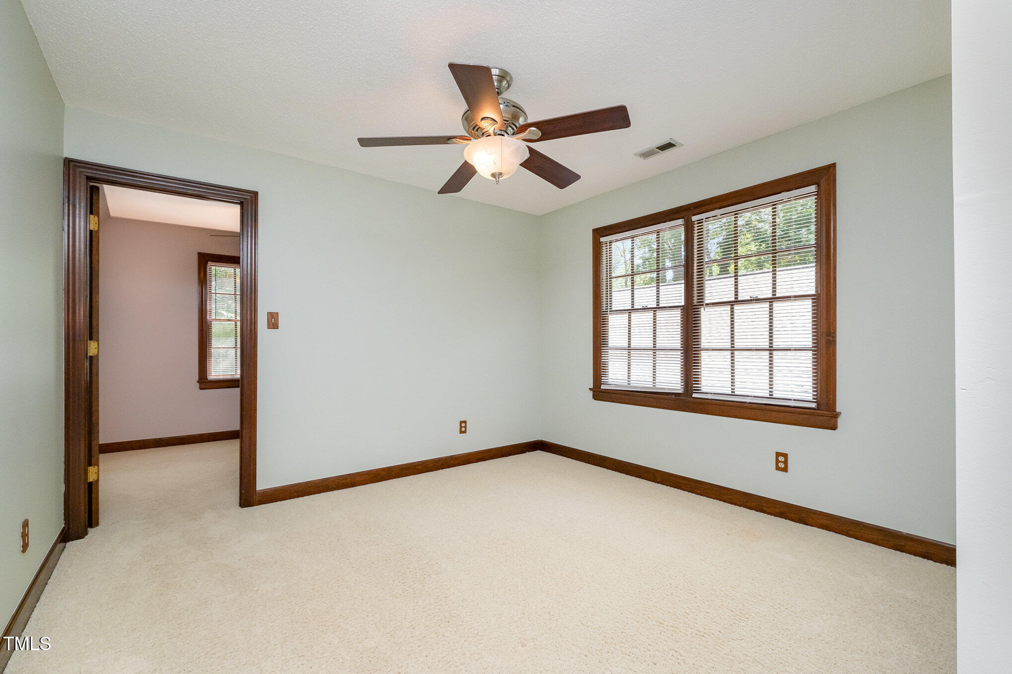 103 Donna Place Cary, NC 27513 - Photo 23 of 35 a view of an empty room with a window