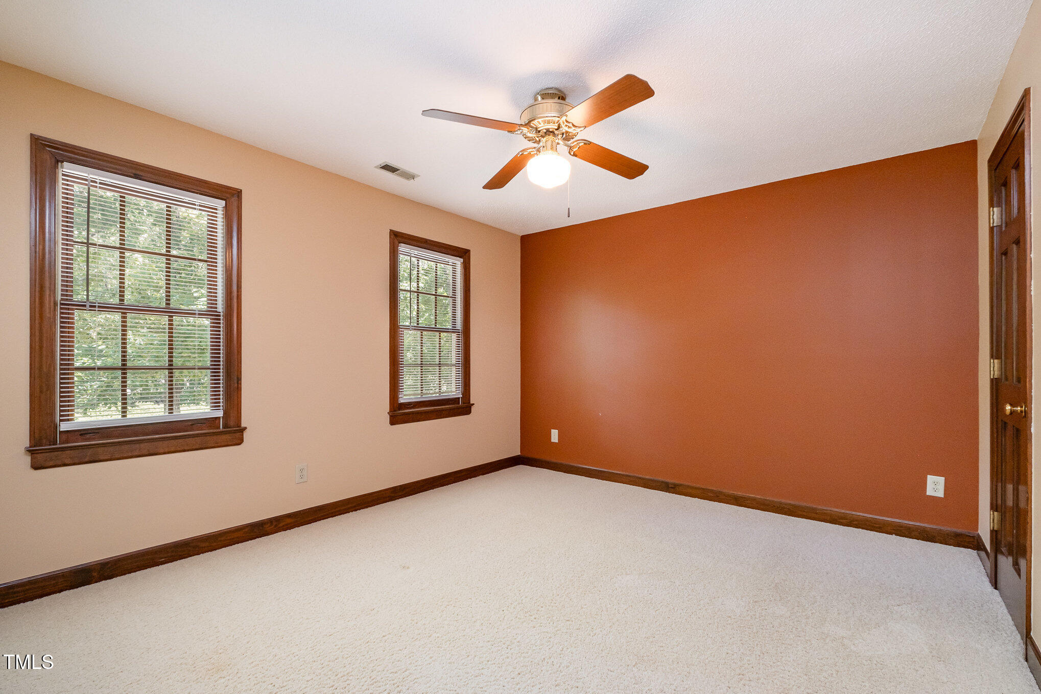 103 Donna Place Cary, NC 27513 - Photo 24 of 35 a view of an empty room with a window