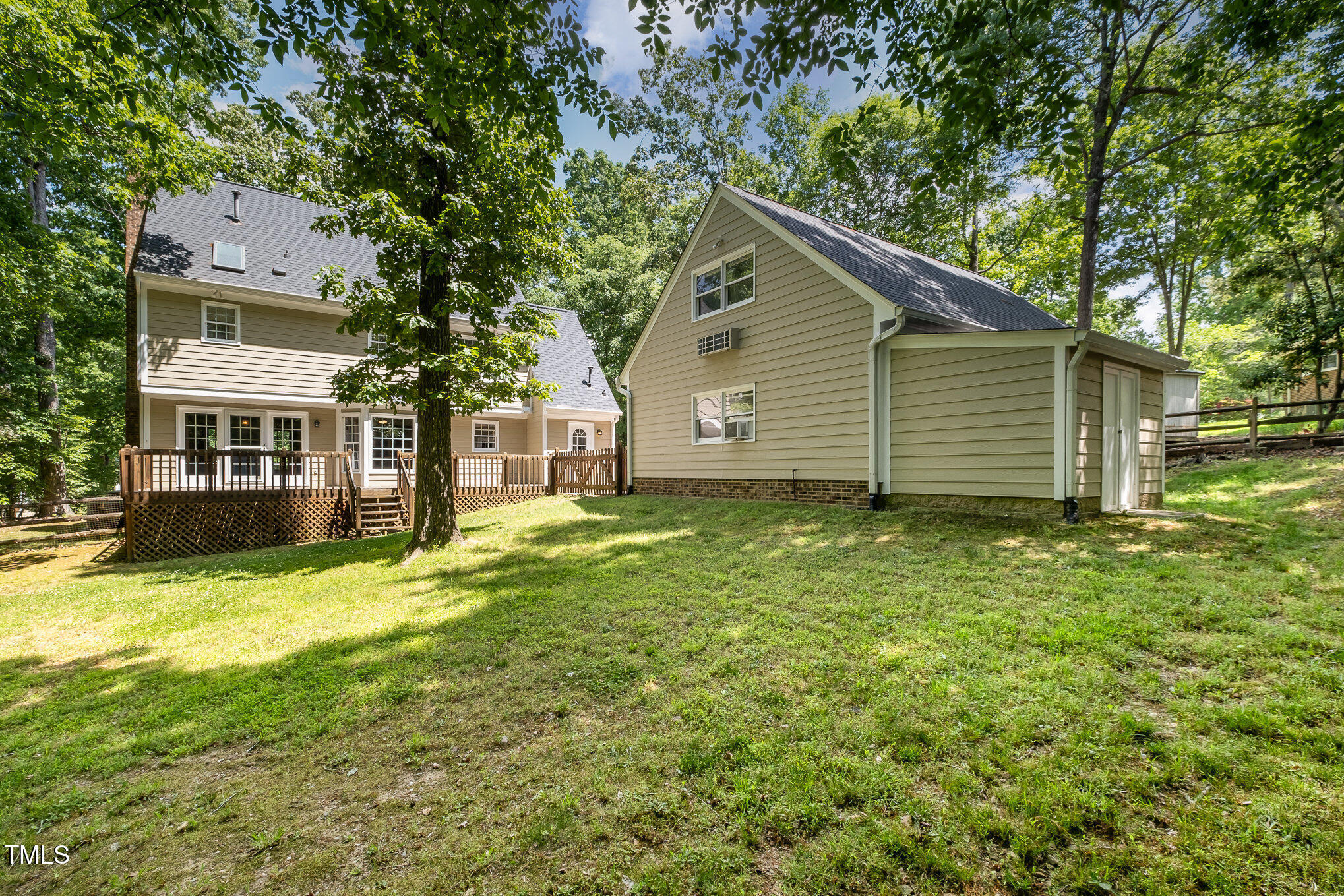 103 Donna Place Cary, NC 27513 - Photo 27 of 35 a view of a house with a yard