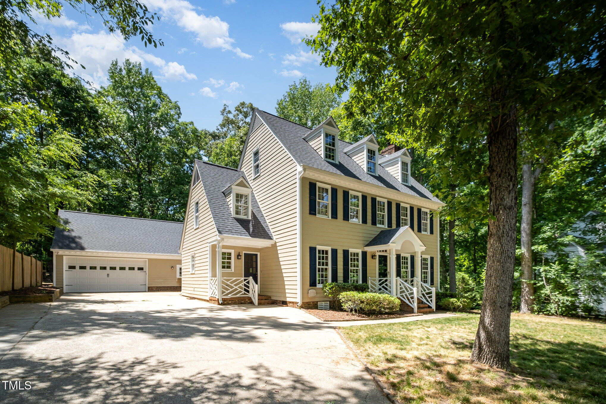 103 Donna Place Cary, NC 27513 - Photo 2 of 35 a front view of a house with a yard