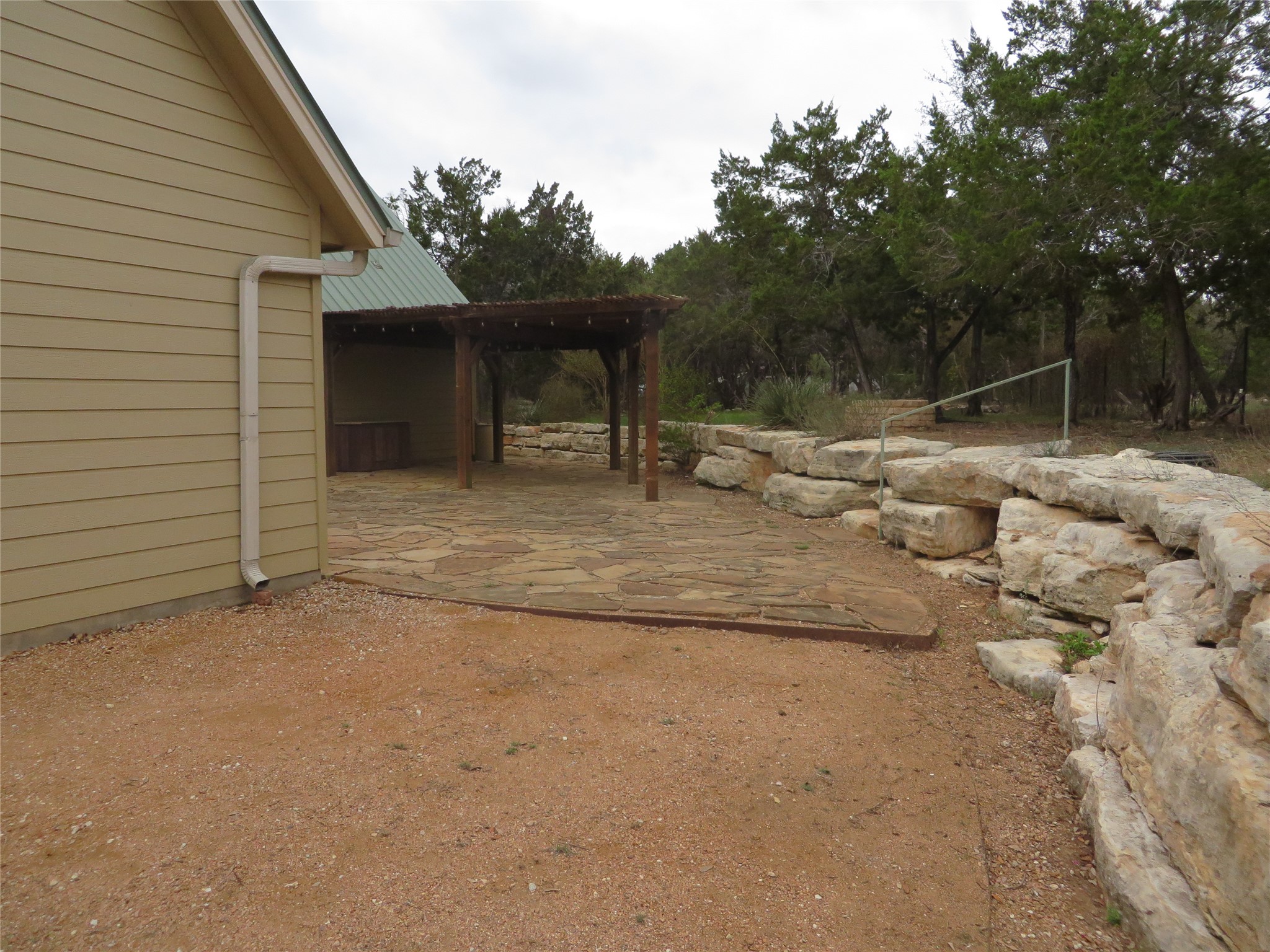 1761 Cottonwood Road Fischer, TX 78623 - Photo 11 of 29 a view of a house with backyard