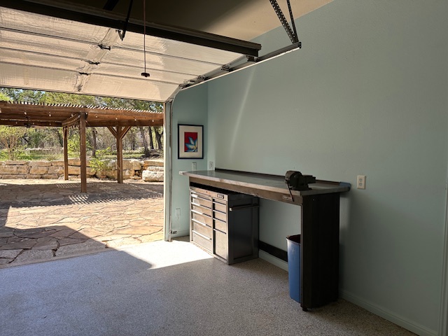 1761 Cottonwood Road Fischer, TX 78623 - Photo 13 of 29 a view of a room with wooden floor and windows