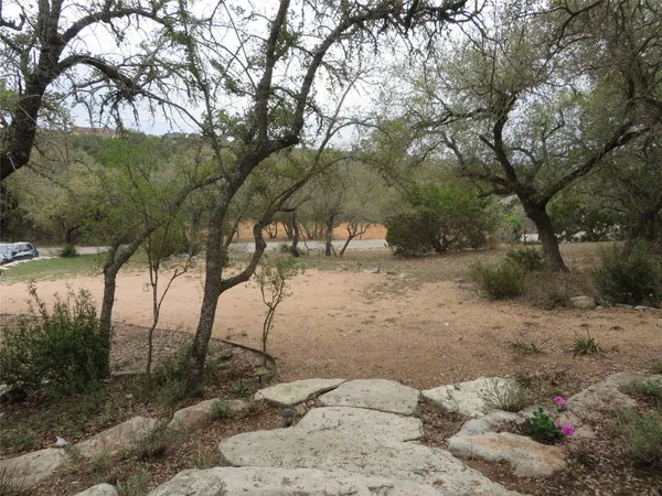 a view of backyard with green space